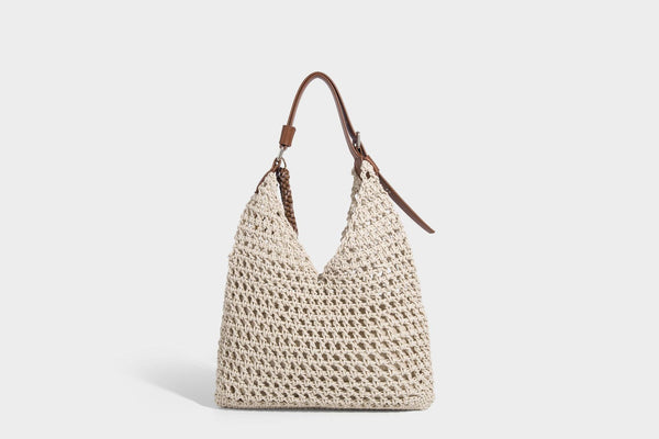 Slouchy open-knit crochet hobo tote bag with leather-look top handle and metal buckle hardware, detail view 18