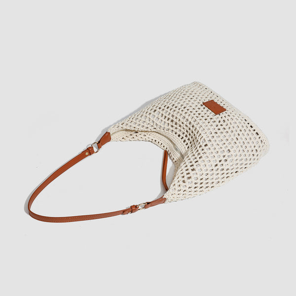 Cream open-weave crochet hobo shoulder bag with tan leather-look strap and gold-tone ring hardware, detail view 4