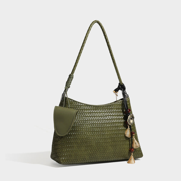 Woven-texture hobo shoulder bag in brown with braided top handle, adjustable crossbody strap, front flap pocket, and, detail