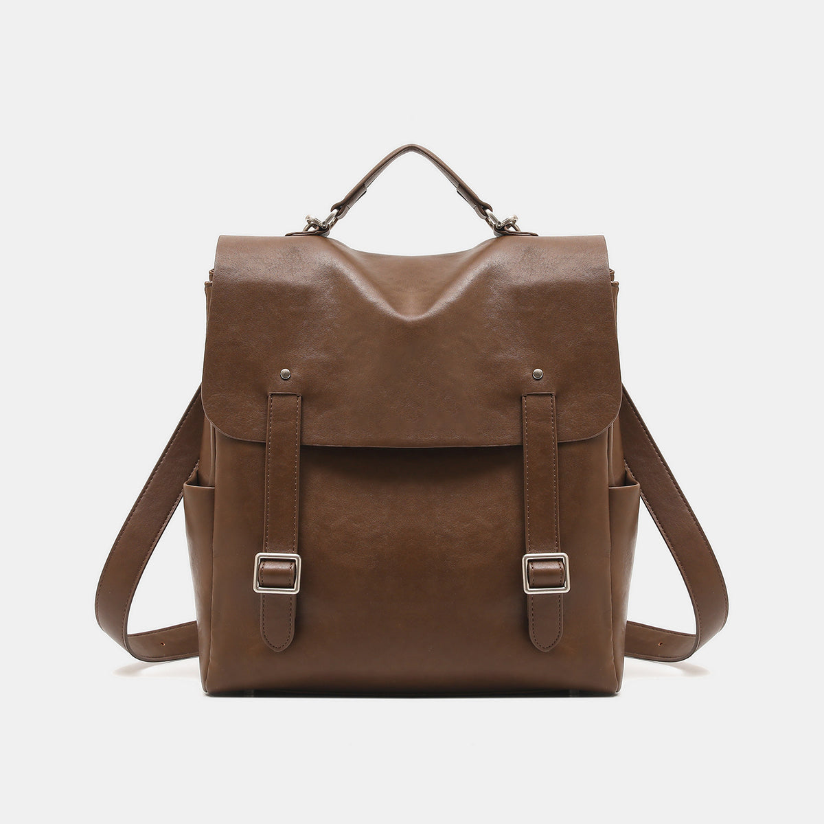 Structured flap backpack handbag in smooth leather-look finish with buckle front pocket, top handle, and silver-tone