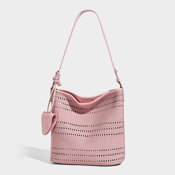 Handwoven open-weave shoulder bag with leather-look trim, knotted adjustable strap, and clip-on sunglasses sleeve pouch