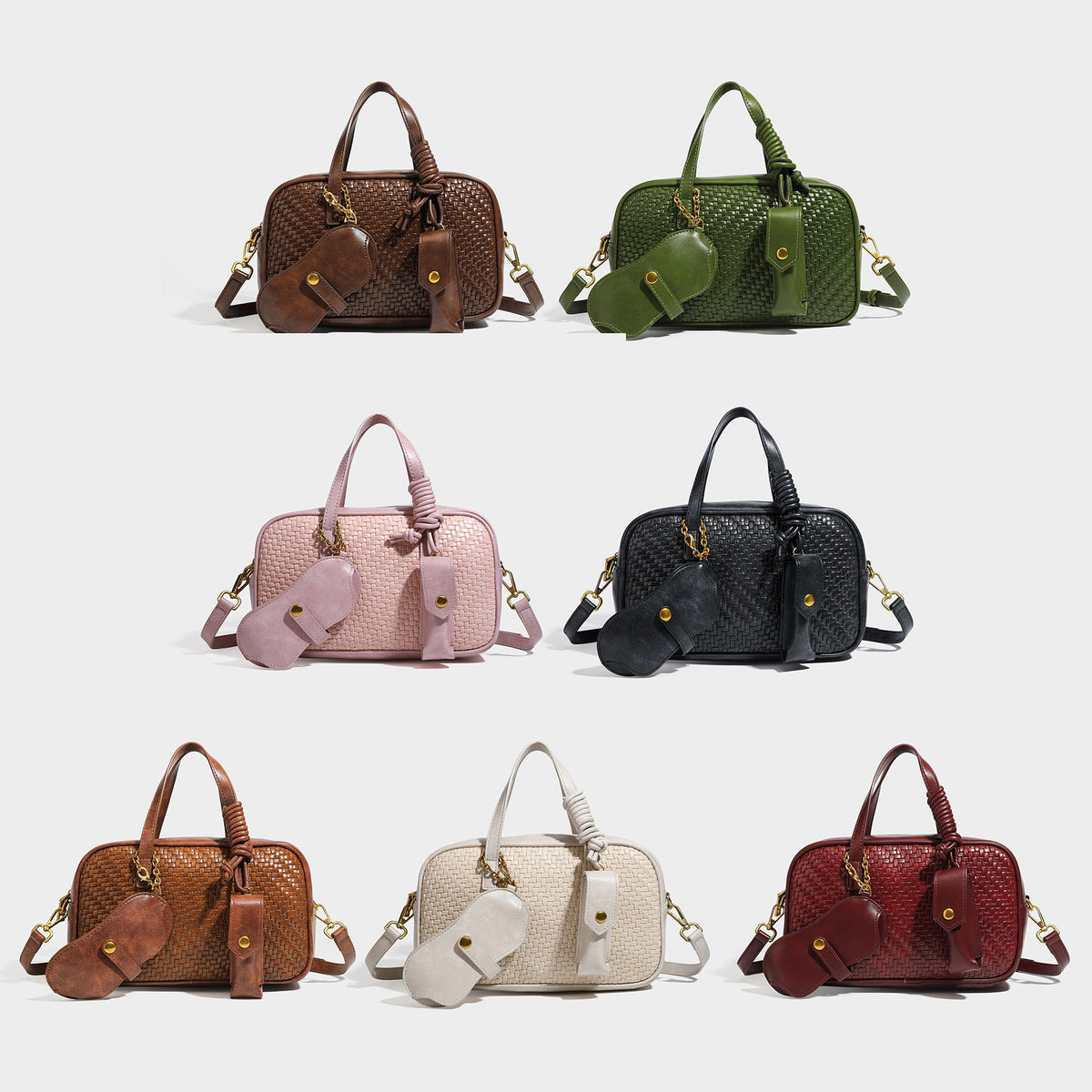 Structured rectangular satchel bag with woven leather-look front panel, gold-tone hardware, dual top handles, detachable