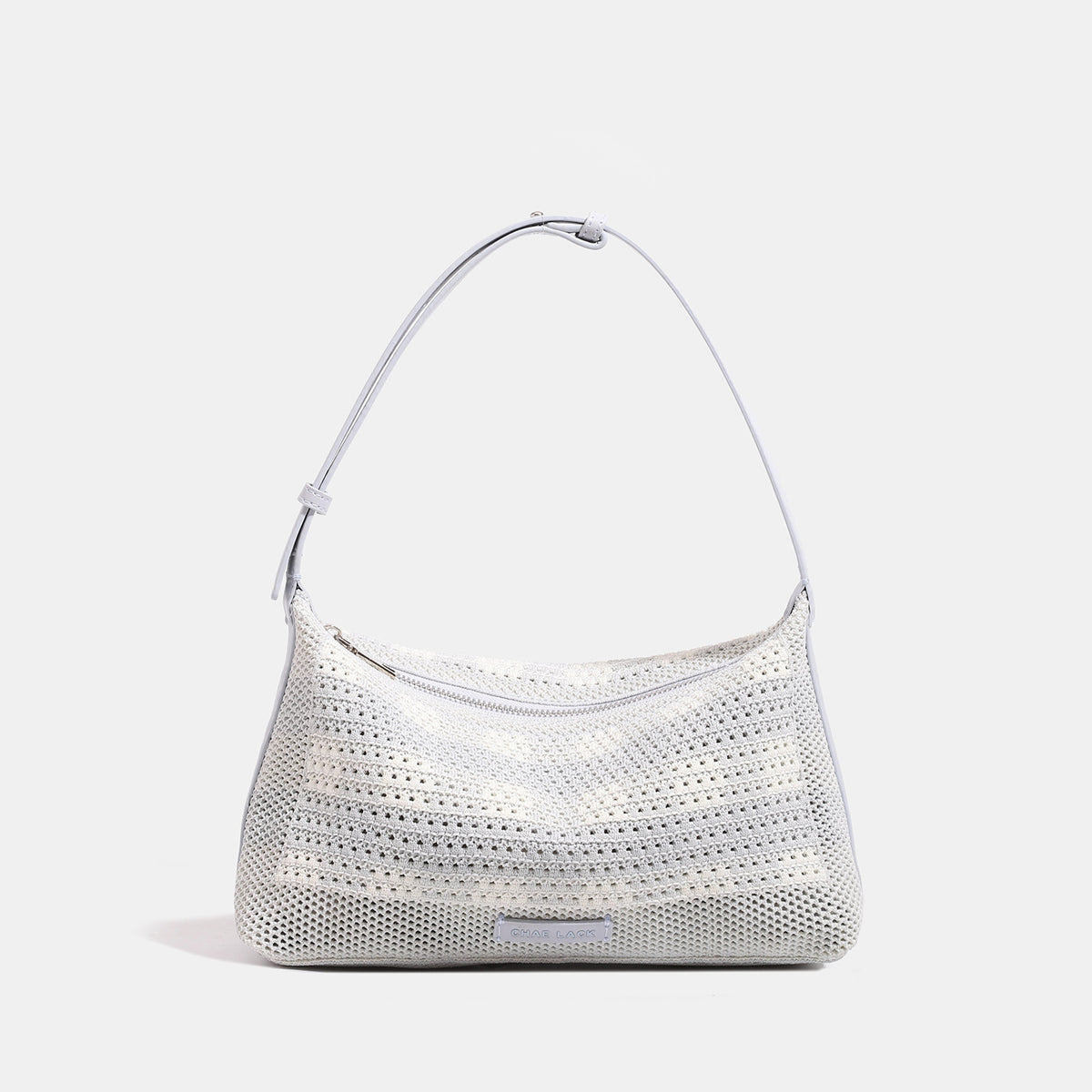 Compact open-weave hobo shoulder bag with zip top, leather-look trim, and adjustable strap, detail view 7