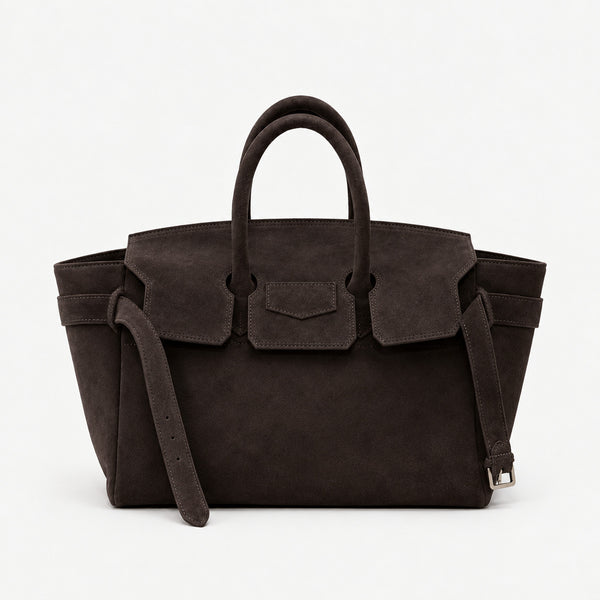 Große strukturierte Trapez-Tote aus mattem, veloursähnlichem Material mit zwei Tragegriffen und Gurt mit Schnallendetail, Detailansicht