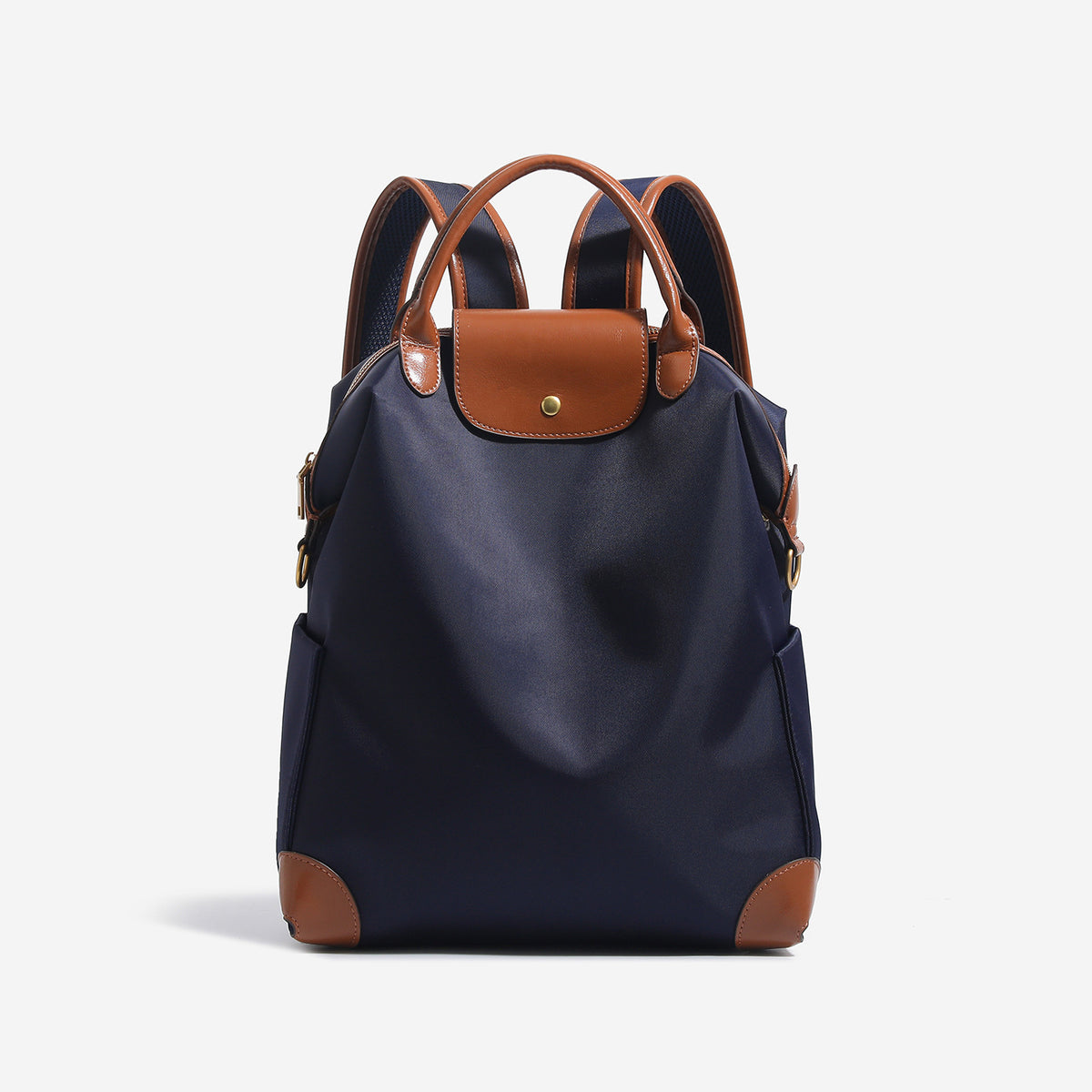 Large matte nylon backpack handbag with cognac leather-look trim, snap flap, and gold-tone hardware, detail view 6