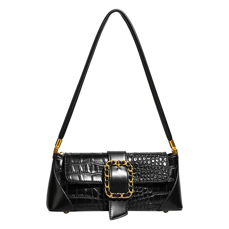 Crocodile-embossed leather-look baguette shoulder bag with gold-tone chain buckle closure and single shoulder strap, detail