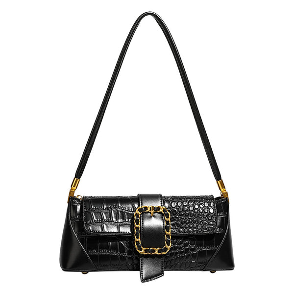 Crocodile-embossed leather-look baguette shoulder bag with gold-tone chain buckle closure and single shoulder strap, detail