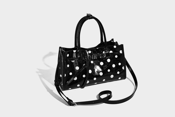 Structured glossy leather-look polka-dot satchel tote with dual top handles and detachable shoulder strap, detail view 13
