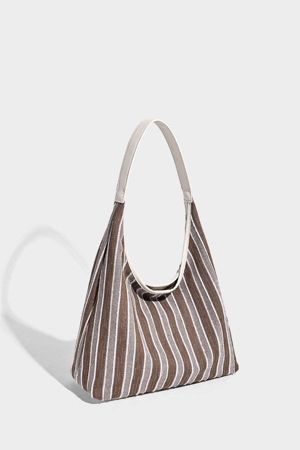 Slouchy striped canvas hobo shoulder bag with cream trim and long knotted strap, detail view 15
