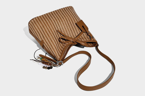 Slouchy open-weave shoulder tote bag with leather-look tan trim, tie-front closure, and long adjustable strap, detail view 24