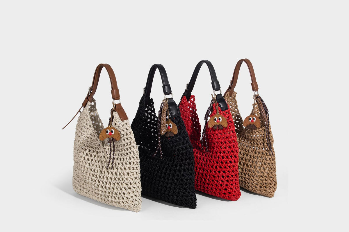Slouchy open-knit crochet hobo tote bag with leather-look top handle and metal buckle hardware, detail view 12