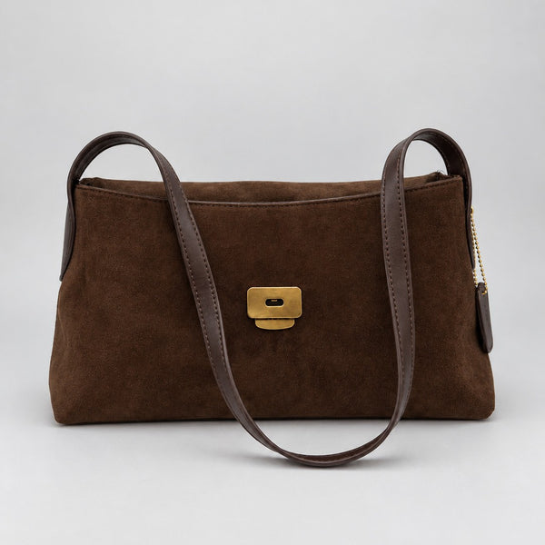 Rectangular matte suede-finish flap shoulder bag with slim dark strap and gold-tone turn-lock hardware, detail view 4