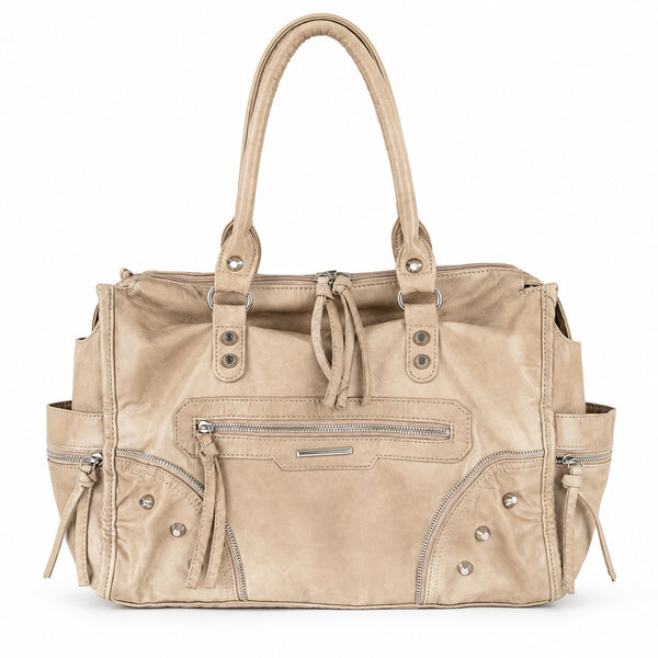 Large distressed leather-look moto tote bag with silver rivets, tassel zip pulls, front zip pocket, and dual top handles