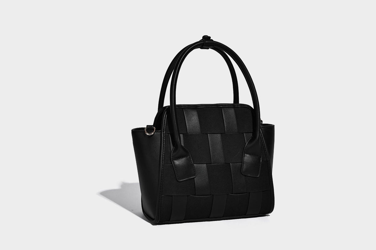 Small structured woven-panel mini tote bag with double top handles and detachable crossbody strap in matte leather-look