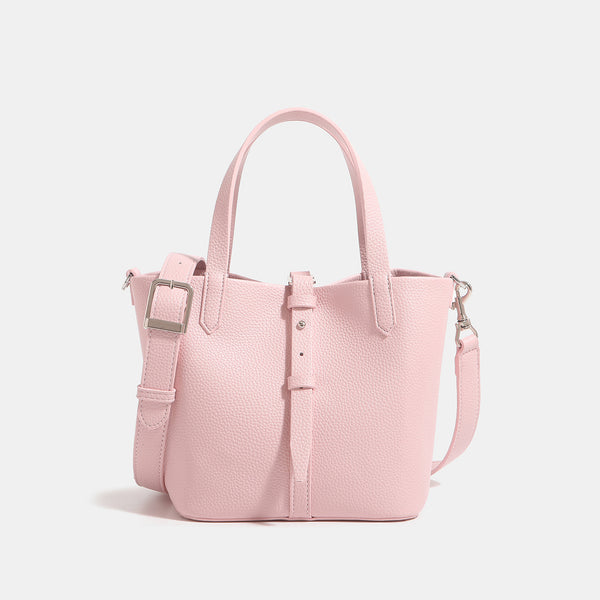 Small structured pebbled leather-look bucket tote bag with dual top handles and silver-tone hardware, detail view 8