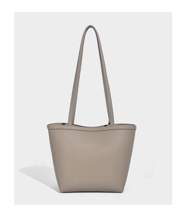 Structured pebbled leather-look tote bag in taupe with long shoulder strap, detachable zip pouch, and pink tulip flower