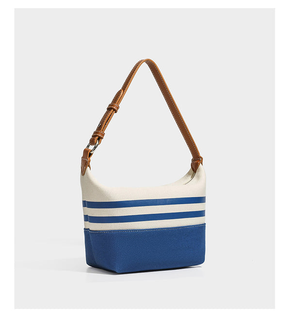 Creme-blau gestreifte Canvas-Schultertasche mit hellbraunem Riemen in Lederoptik und Reißverschluss in Silberoptik, Detailansicht 9