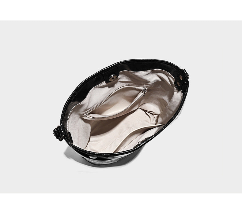 Glossy crinkled polka-dot bucket hobo bag with adjustable crossbody strap and side pouch, detail view 8
