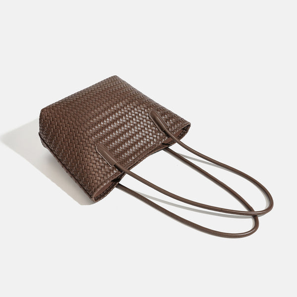 Structured woven leather-look tote bag with long shoulder straps and matching zippered pouch, detail view 4