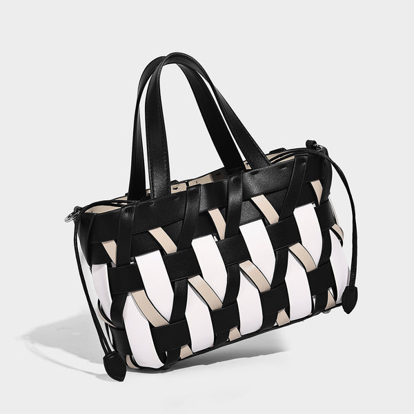 Small structured woven lattice tote bag with dual top handles and detachable shoulder strap in brown and cream leather-look