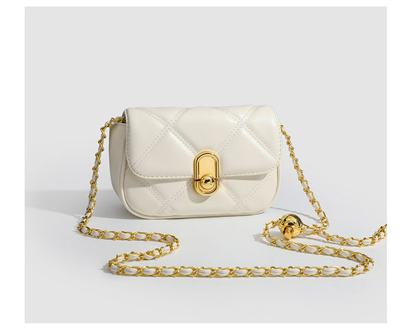 Compact diamond-quilted mini crossbody bag with gold-tone turn-lock closure and woven chain strap, detail view 13