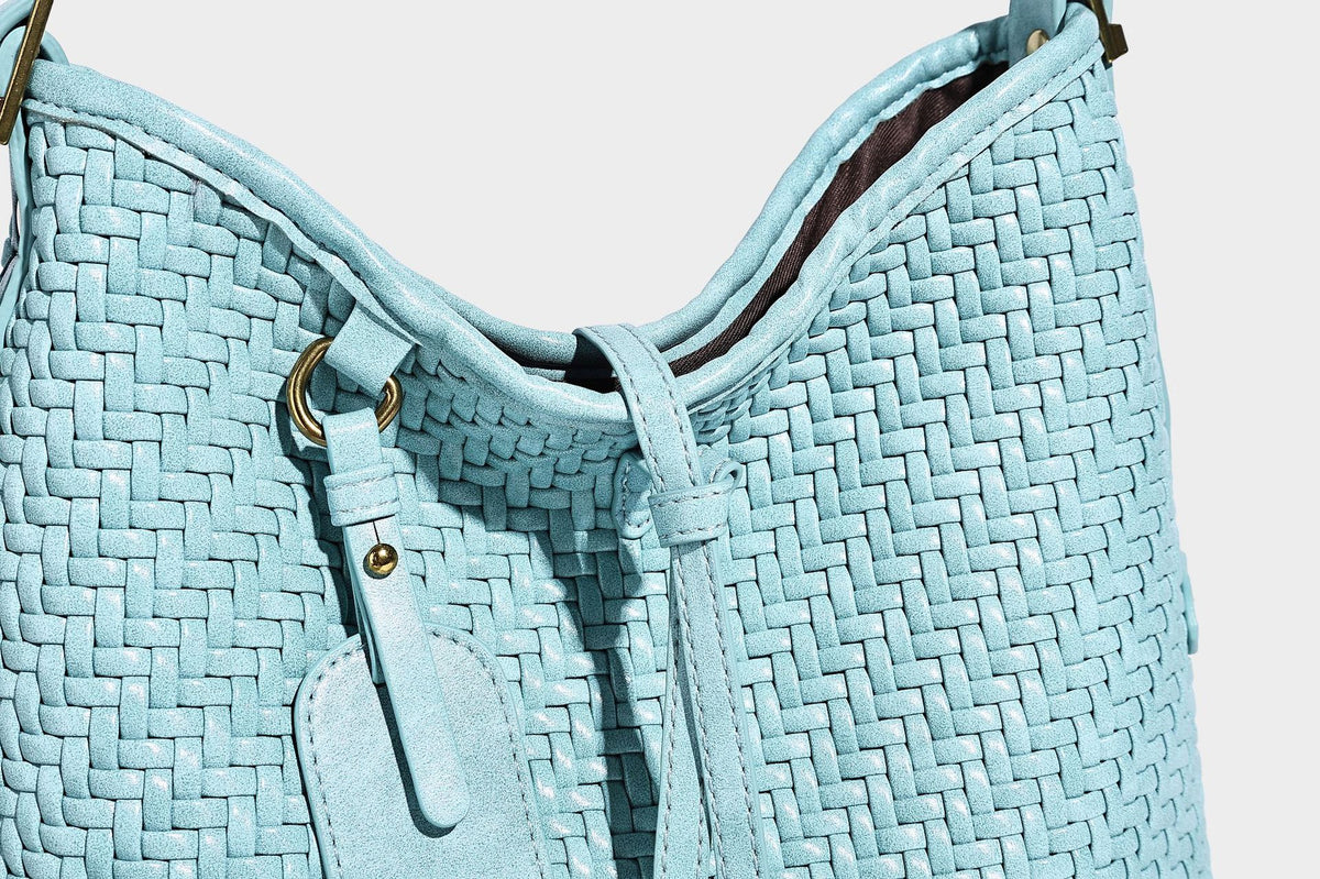 Slouchy woven-texture bucket shoulder bag with tassel tie closure and gold-tone hardware, detail view 35