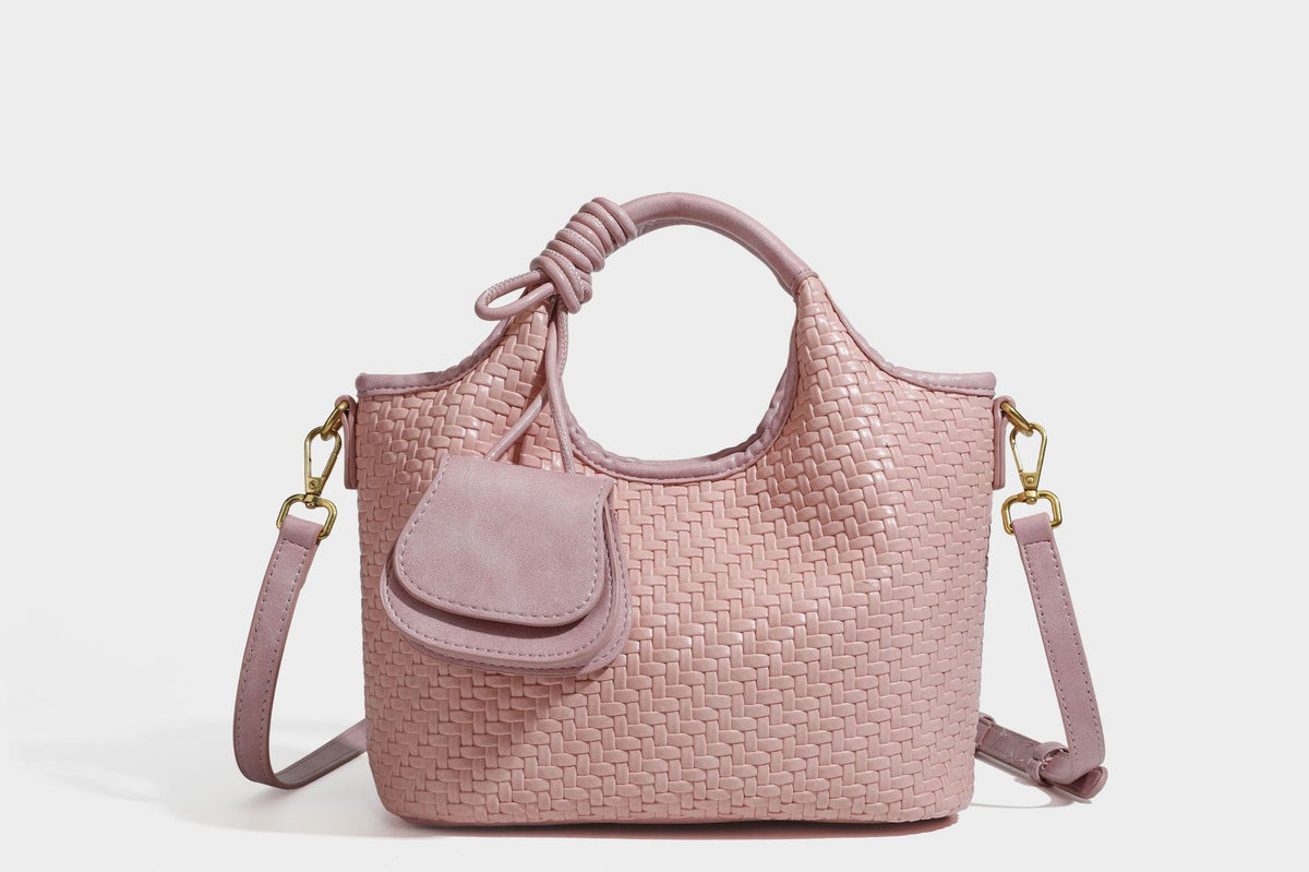 Woven leather-look tote bag in mocha brown with knotted top handle, front flap pocket, and detachable crossbody strap with