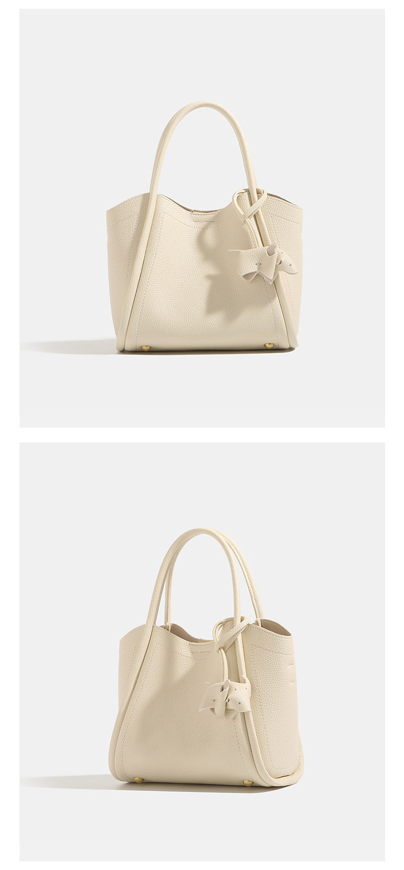 Small structured pebbled leather-look bucket tote bag with bow charm tie closure and gold-tone hardware, detail view 10