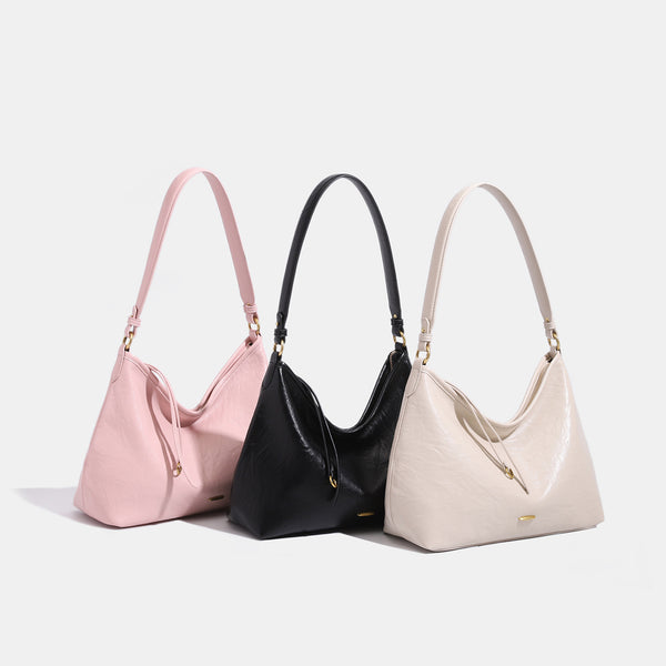 Large crinkled leather-look hobo shoulder bag with zip closure and gold-tone hardware, detail view 2