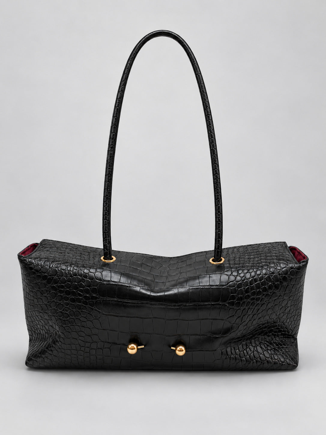 Wide embossed-texture shoulder tote bag with single loop handle and gold-tone toggle hardware, detail view 10