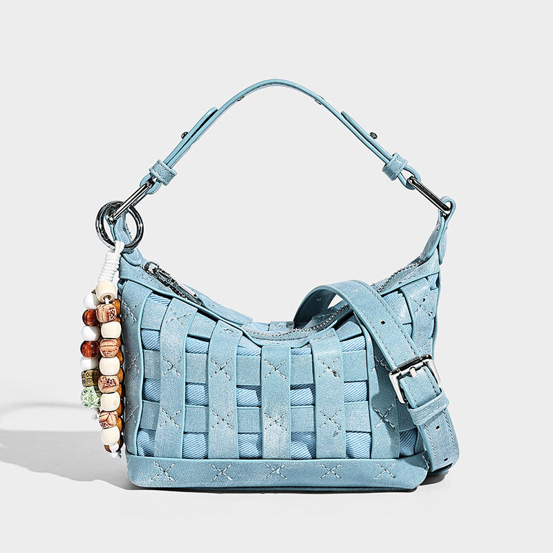 Small woven convertible shoulder bag with top zipper, silver-tone hardware, and detachable crossbody strap, detail view 12