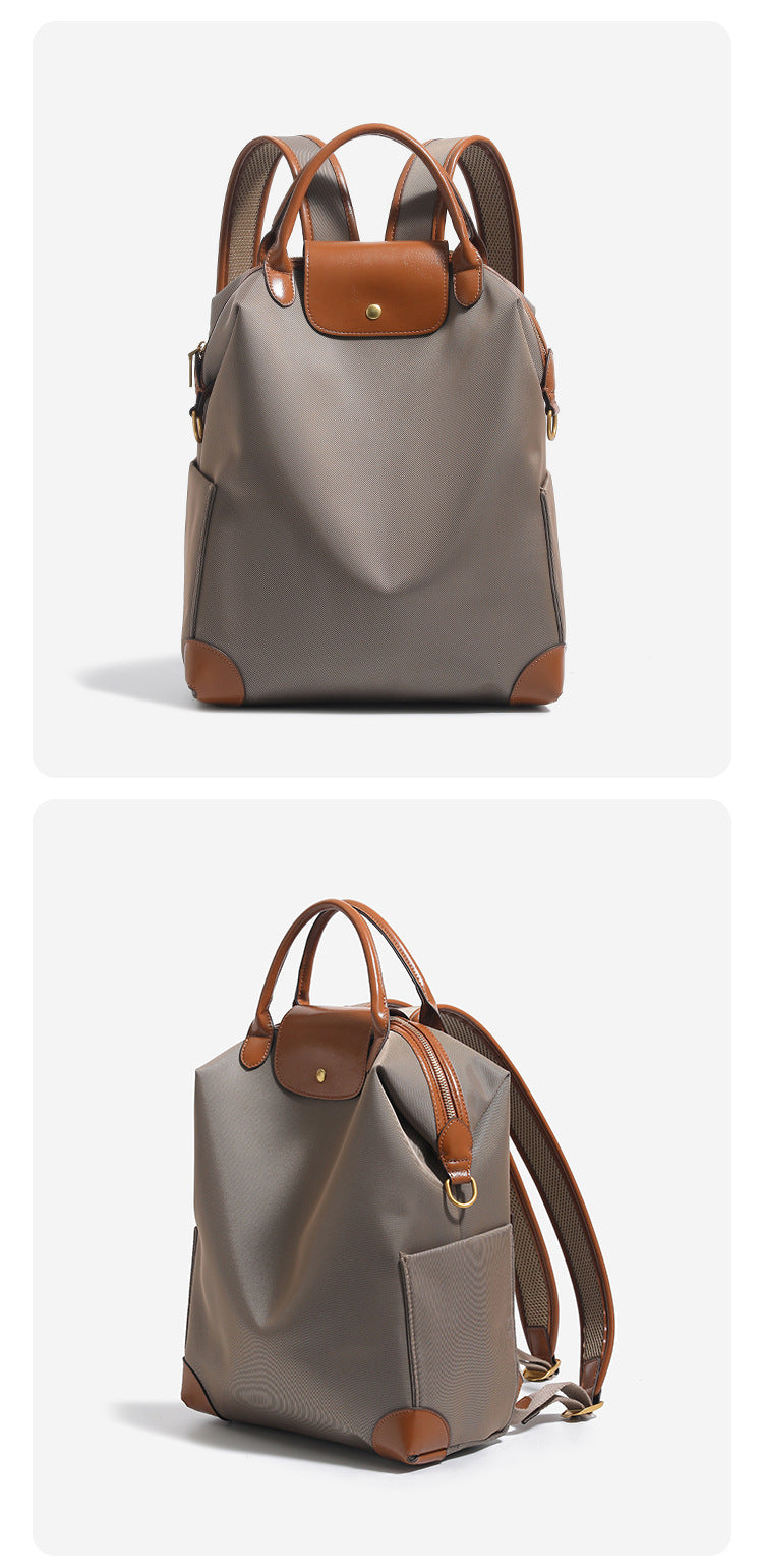 Large matte nylon backpack handbag with cognac leather-look trim, snap flap, and gold-tone hardware, detail view 14