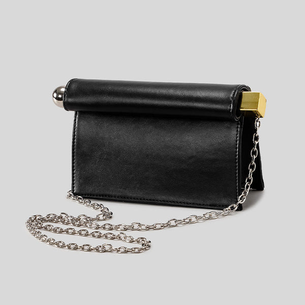 Structured rectangular clutch bag with rolled-top bar closure, gold-tone and silver-tone mixed metal hardware, detail view 4