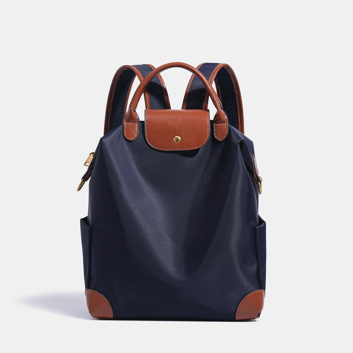 Soft rectangular nylon convertible backpack handbag with leather-look trim, snap-flap closure, top carry handles, padded