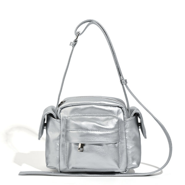 Boxy leather-look crossbody bag with front zip pockets, top zip closure, and long adjustable strap, detail view 5