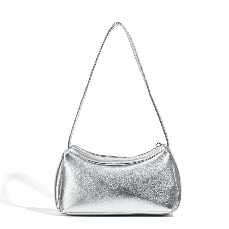 Compact curved silver metallic shoulder bag with top zip closure and slim single strap, detail view 5