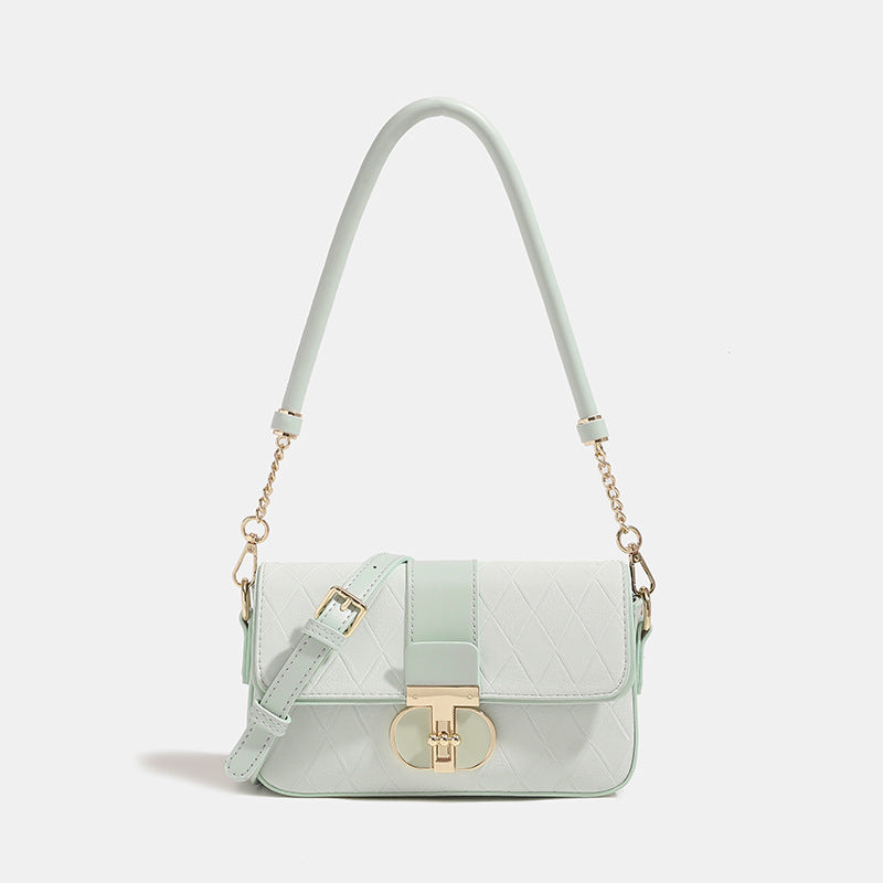 Compact rectangular quilted flap crossbody bag with gold-tone turn-lock closure and chain strap, detail view 9