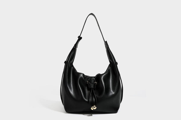 Slouchy hobo bag with smooth leather-look finish, drawstring cinch closure, and gold-tone bead hardware, detail view 33