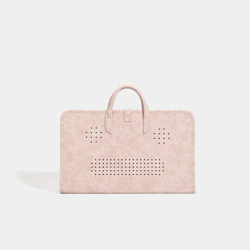 Blush pink structured flat tote bag with matte textured finish, dual top handles, and gold-tone twist clasp, detail view 3