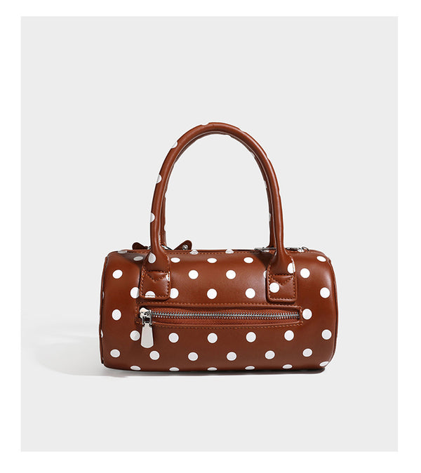 Glänzende Tasche in Zylinderform mit Polka-Dot-Muster, abgerundeten Tragegriffen, Sternanhänger und abnehmbarem Crossbody-Riemen, Detailansicht 12