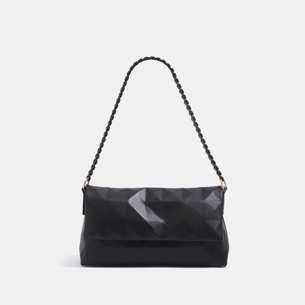 Geometric faceted flap shoulder bag with braided chain strap in black and ivory leather-look finish, detail view 6