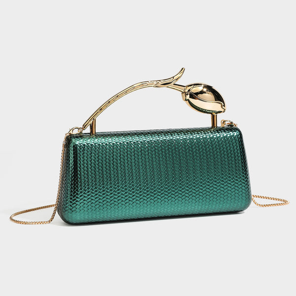 Structured rectangular metallic woven clutch bag with sculptural gold-tone leaf top handle and detachable chain strap, front
