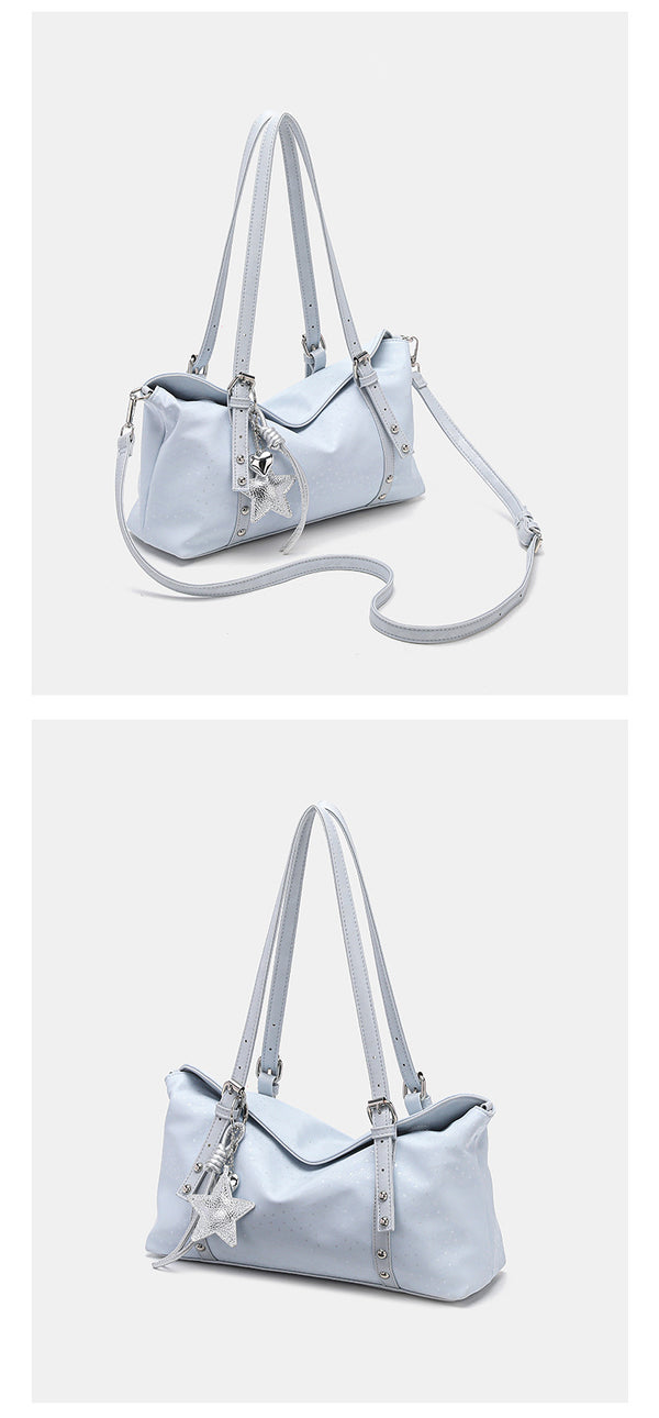 Slouchy leather-look shoulder tote bag with star charm pendant, silver-tone rivets and buckles, detail view 9