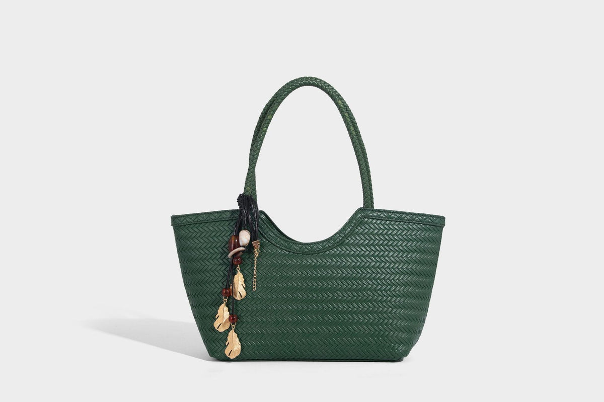 Large open-top woven tote bag with contrasting braided double handles and matching drawstring pouch, detail view 29