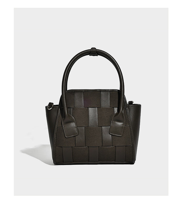 Small structured woven-panel mini tote bag with double top handles and detachable crossbody strap in matte leather-look