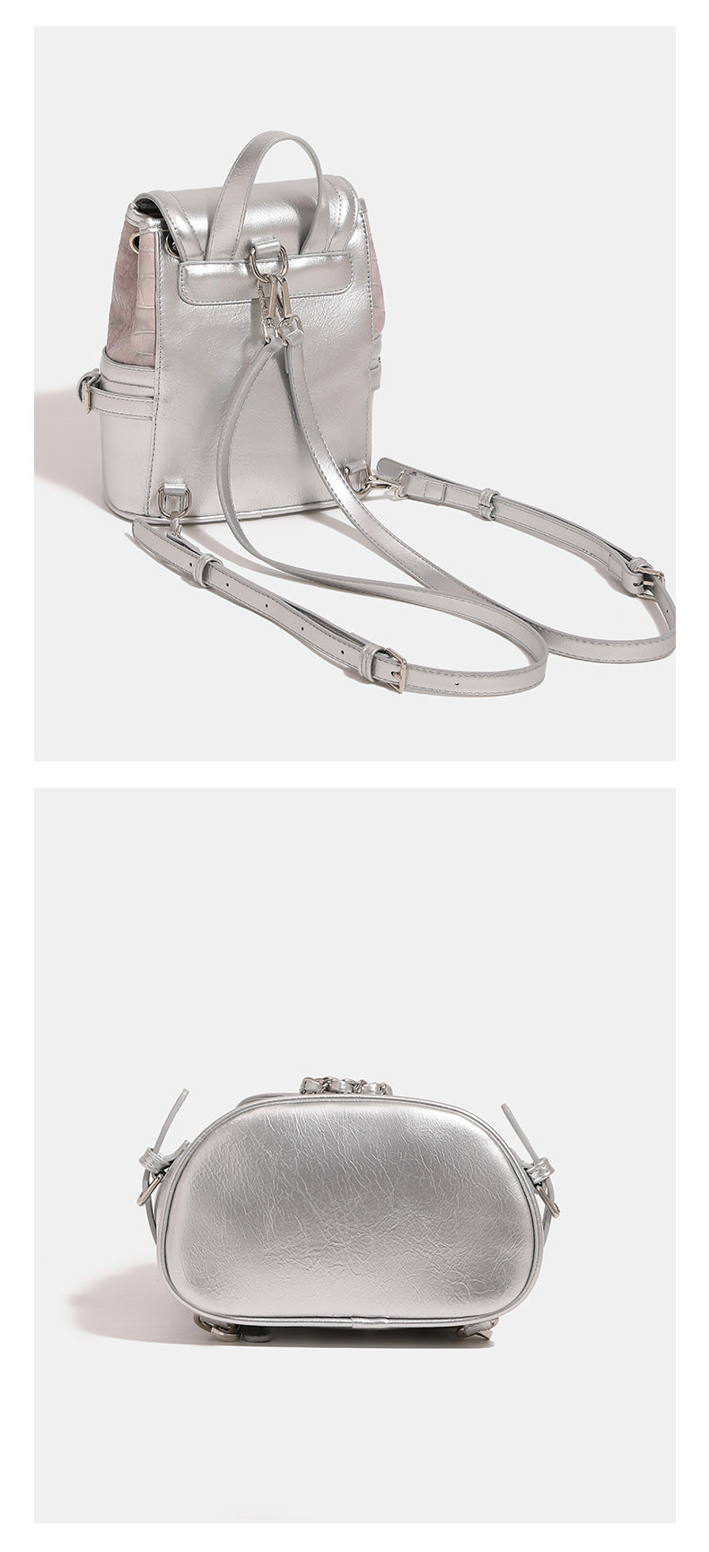 Croc-embossed mini backpack handbag with metallic silver flap, turn-lock closure, chain front detail, and top handle, detail