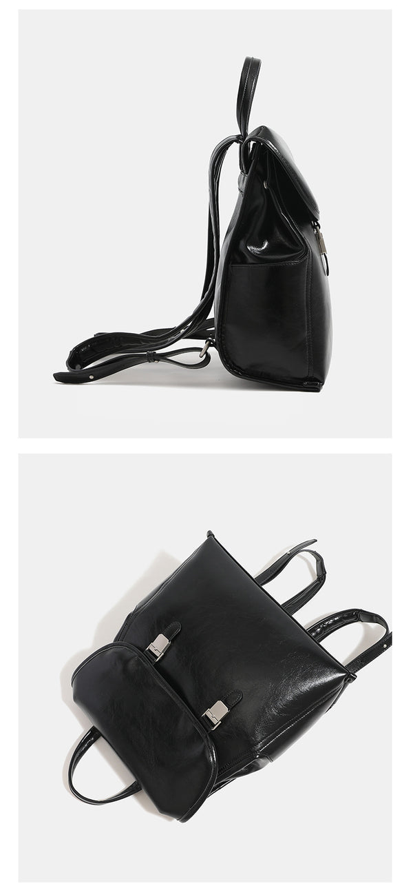 Structured glossy leather-look flap backpack with twin buckle closures and top grab handle, detail view 14