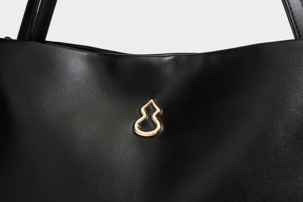 Structured rectangular shoulder tote bag with smooth leather-look finish, long double straps, and gold-tone gourd emblem on