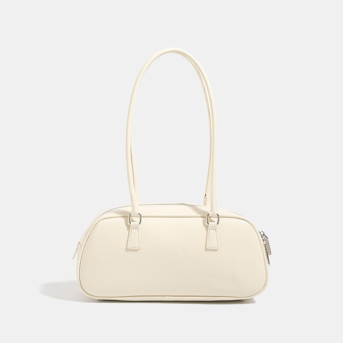 Rounded baguette shoulder bag with glossy leather-look finish, double-pull zip top, dual top handles, and silver-tone, detail