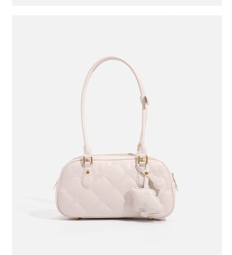 Small structured quilted leather-look zip shoulder bag with gold-tone hardware and adjustable strap, detail view 12